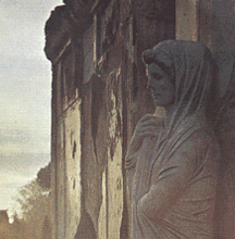 [ilustração: Estátua feminina em necrópole. Pompeia.
]